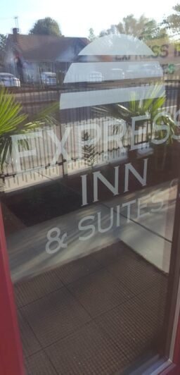 glass door to Express Inn & Suites